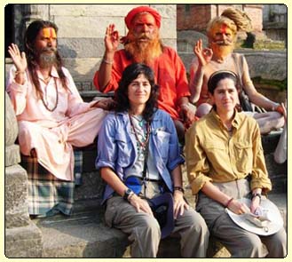 Rocio and her sister with Sadhus in Pashupatinath, Nepal, join our India - Nepal - Tibet tour